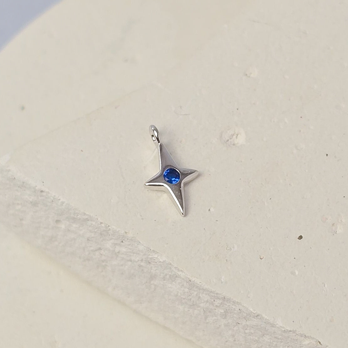 Sterling Silver 4 Pointed Star Charm with Blue CZ