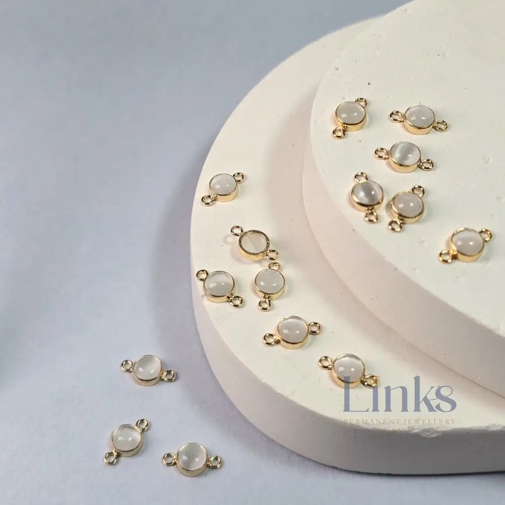4Mm White Cat’s Eye Connector Charm