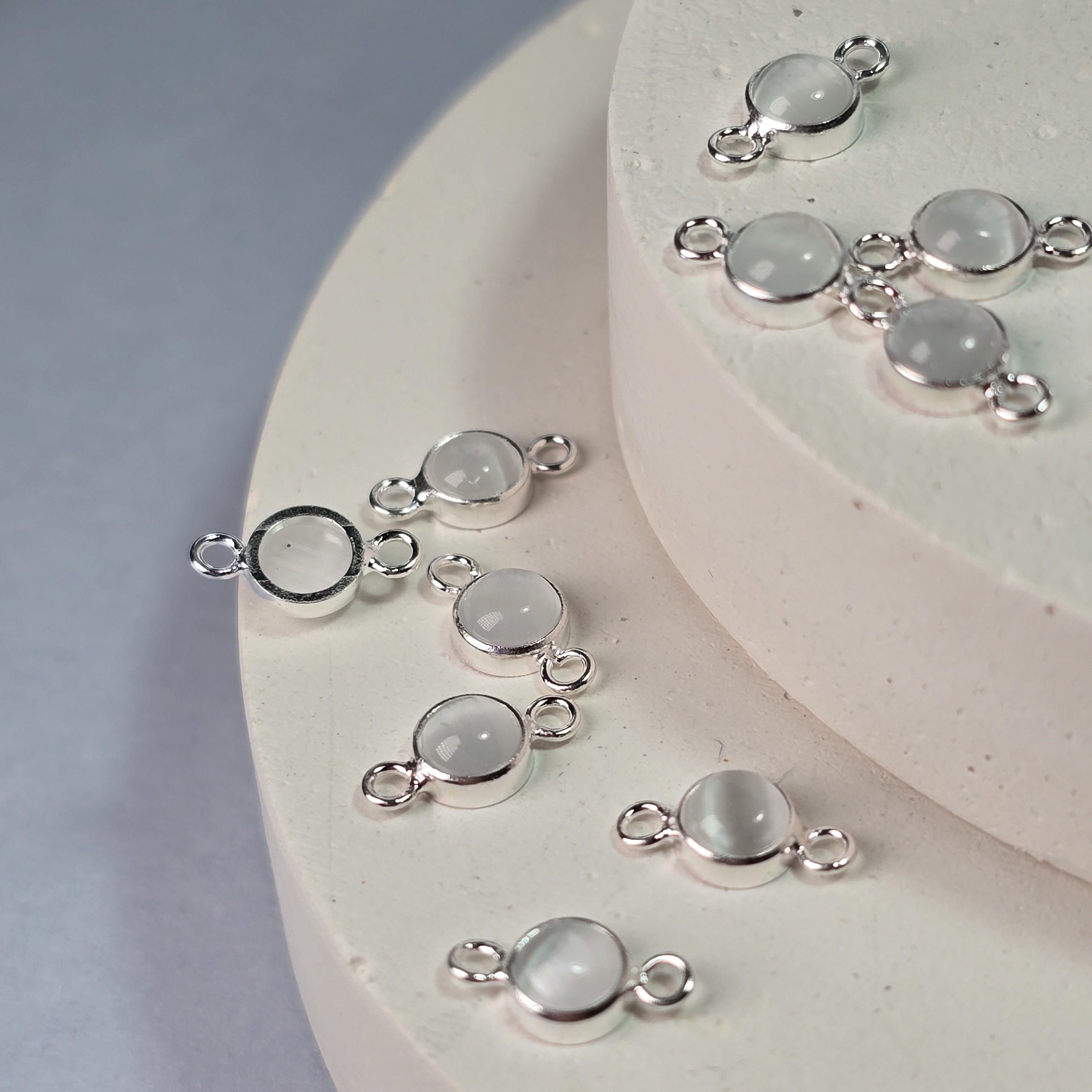 4Mm White Cat’s Eye Connector Charm