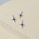 Sterling Silver 4 Pointed Star Charm with Blue CZ
