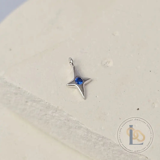 Sterling Silver 4 Pointed Star Charm with Blue CZ