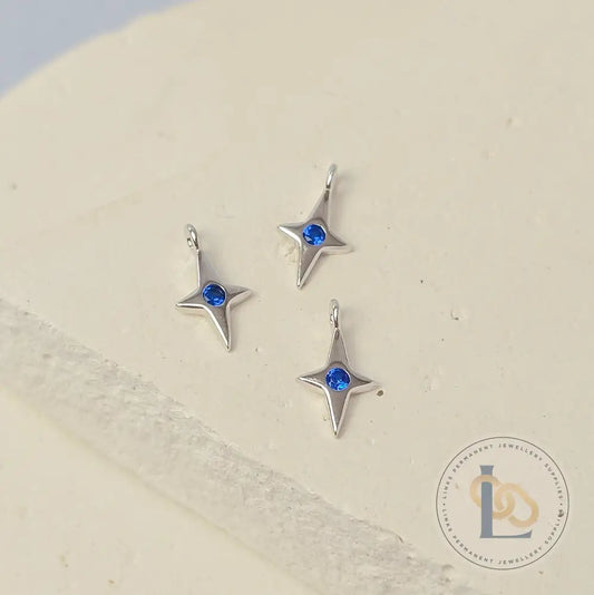 Sterling Silver 4 Pointed Star Charm with Blue CZ