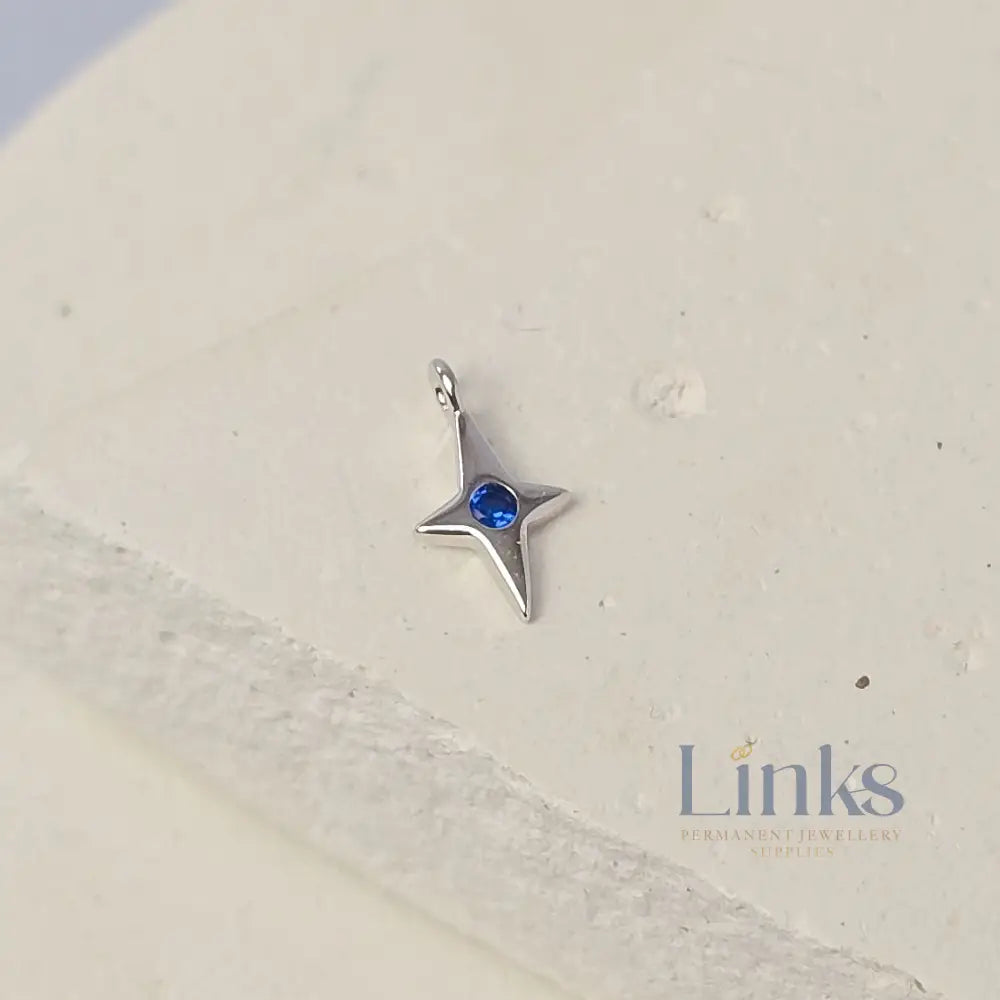 Sterling Silver 4 Pointed Star Charm with Blue CZ